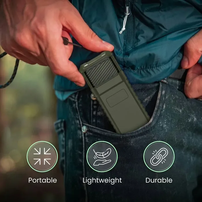 Hands sliding the MoskiCell unit into the front pocket of a pair of jeans